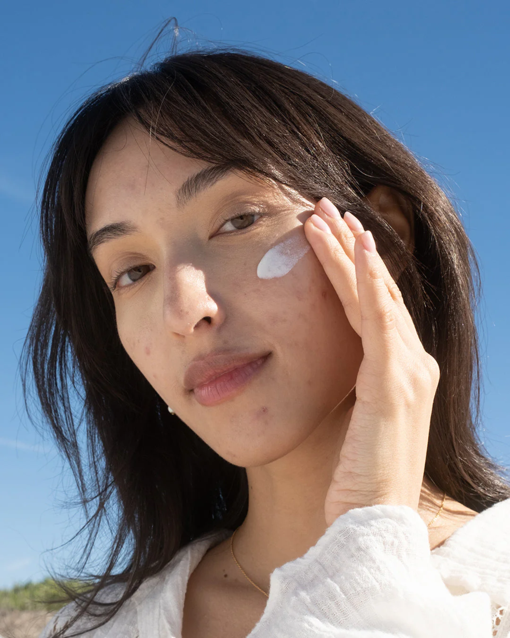 Does Sunscreen Help With Hyperpigmentation? What To Know About SPF and Dark Spots